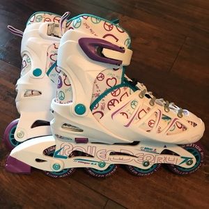 Girls adjustable Rollerblades. Fits size 2-5